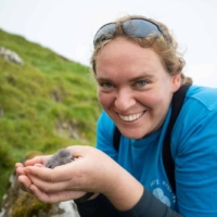 Hannah holding a baby bird