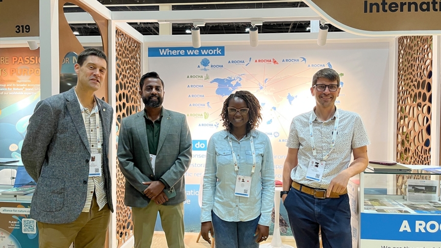 A Rocha International's booth at the exhibition. Left to right: Ed Walker, Avinash Krishnan, Judith Ochieng and Nicholas Warren.